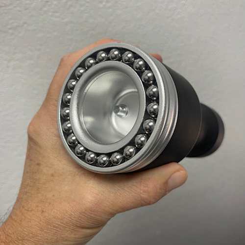 Suction side of rollerball cupping device